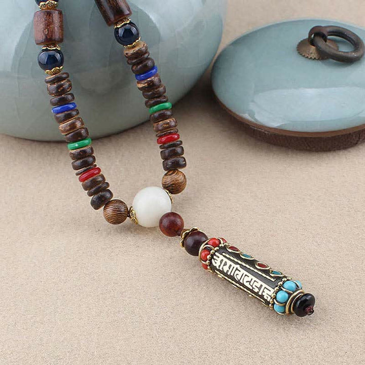 Buddha Stones tibétain Om Mani Padme Hum Dzi perle wengé bois collier pendentif