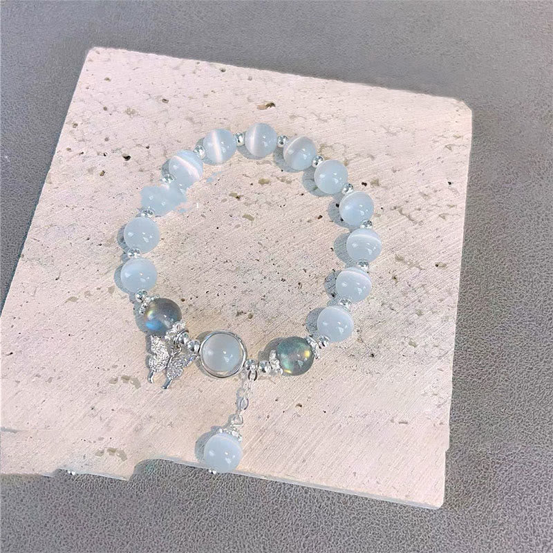 Bracelet de soutien à breloques en forme d'étoile, de papillon et de pierre de lune avec œil de chat et Buddha Stones