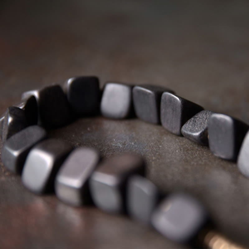 Bracelet double tour en cuivre et bois d'ébène tibétain avec Buddha Stones