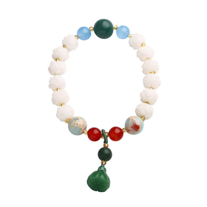 Bracelet de paix et d'harmonie sculpté en perles de lotus et graines de Bodhi en Buddha Stones