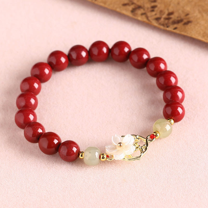 Bracelet de bénédiction en pierre de cinabre naturelle et jade Tridacna avec Buddha Stones