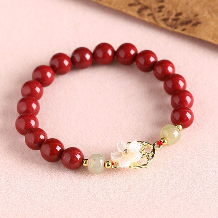 Bracelet de bénédiction en pierre de cinabre naturelle et jade Tridacna avec Buddha Stones