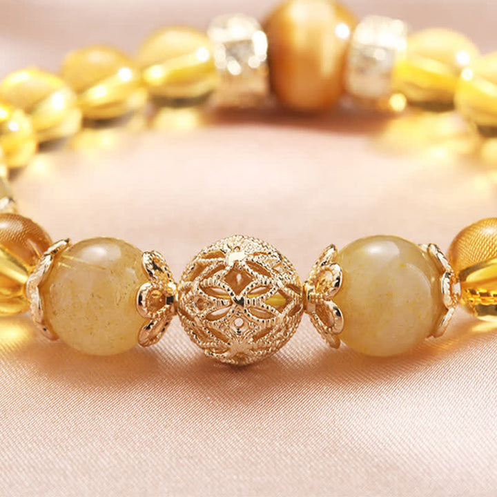 Bracelet de perles de prospérité et de générosité en Buddha Stones et citrine