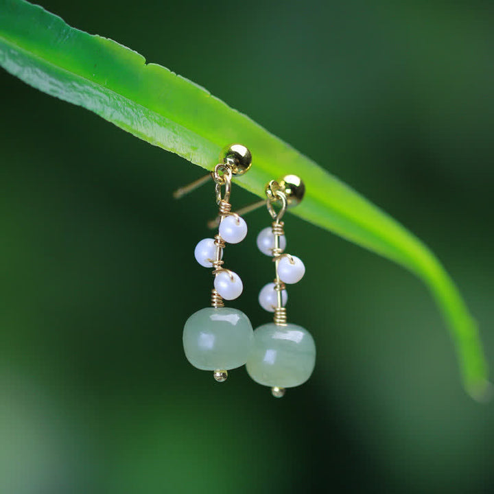 Boucles d'oreilles pendantes en plaqué or 14 carats avec motif de fleur de jade Hetian