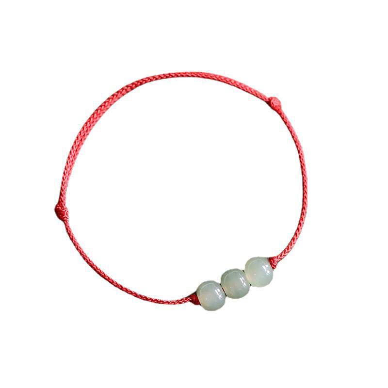 Bracelet tissé en fil de jade à trois perles de Buddha Stones