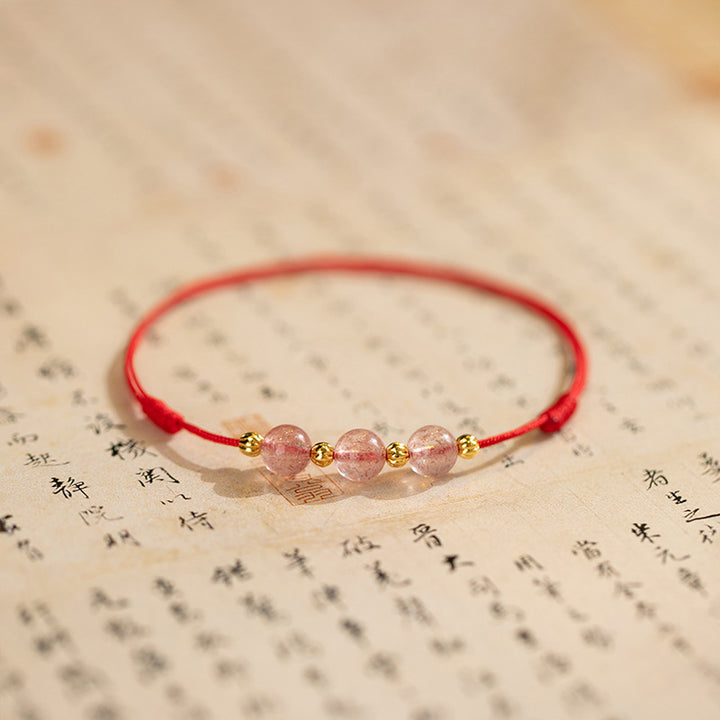 Bracelet de cheville en fil rouge avec perles en cristal de fraise et Buddha Stones
