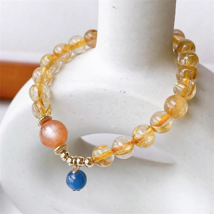 Bracelet de richesse en quartz rutile naturel et or de Buddha Stones avec pierre de soleil et kyanite