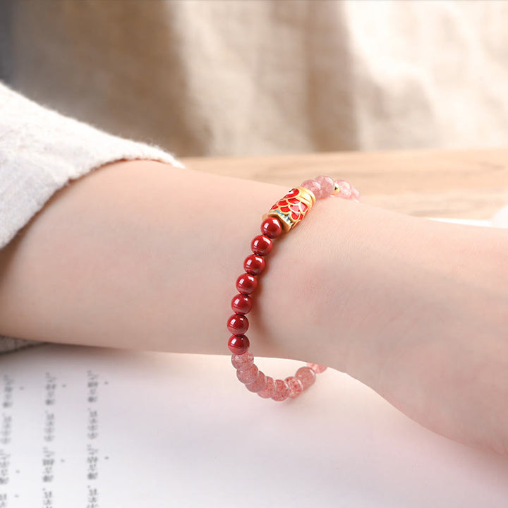 Bracelet de guérison porte-bonheur en quartz fraise et cinabre en Buddha Stones