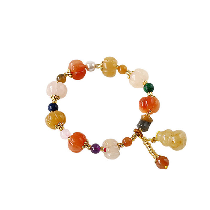 Bracelet à breloques en perles de citrouille Pixiu en soie dorée naturelle et cristaux de jade