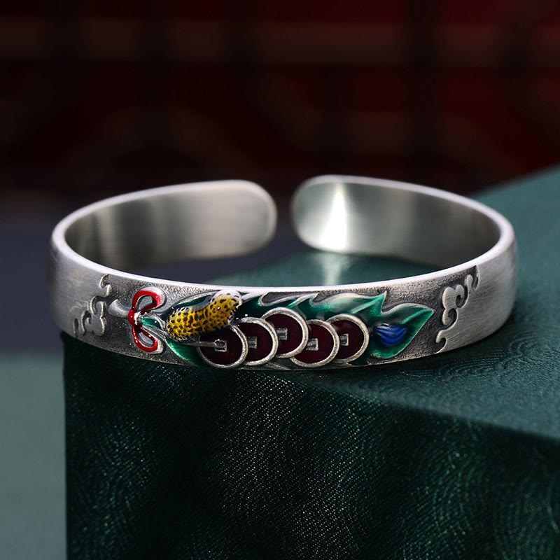 Bracelet Feng Shui en Buddha Stones avec cinq pièces de monnaie de l'empereur et cacahuètes