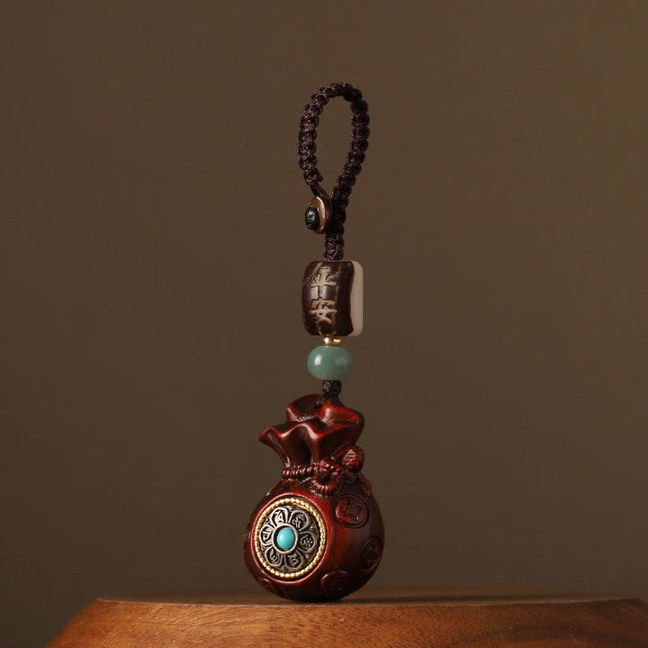 Buddha Stones Petite Feuille Bois de Santal Rouge Bois de Santal Vert Sac d'Argent Om Mani Padme Hum Protection Rotative Décoration Suspendue