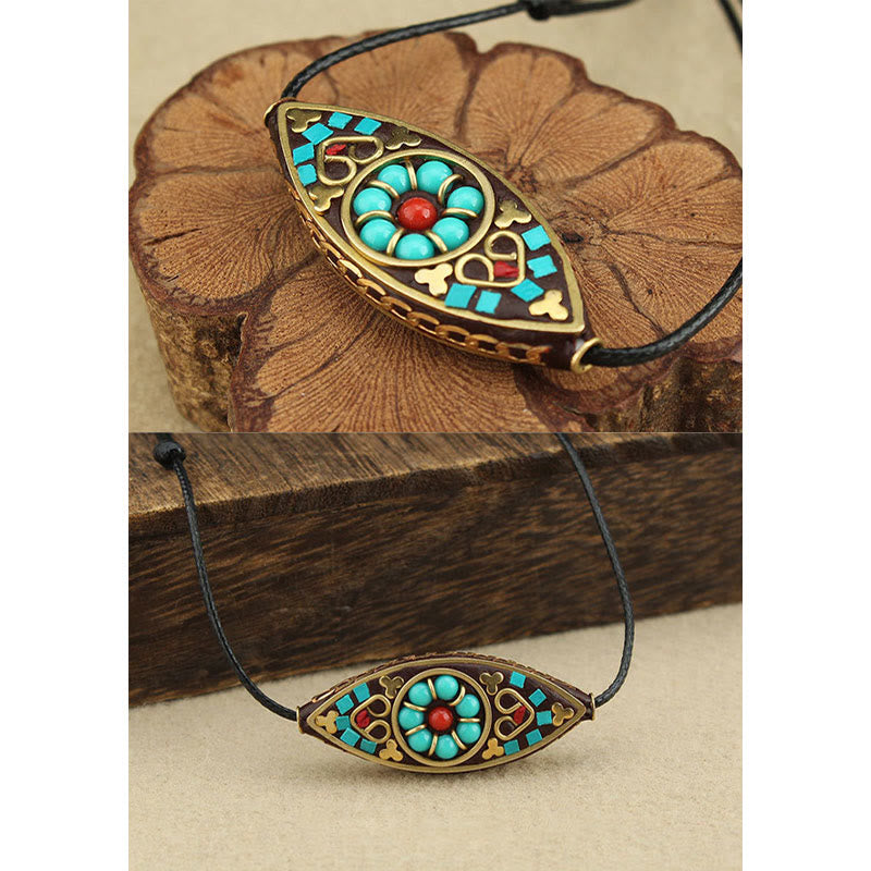 Collier pendentif en perles turquoises du Tibet avec Buddha Stones et motif marquise, protection et force