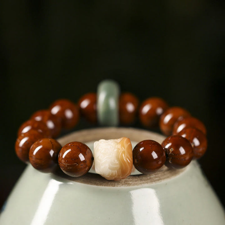 Bracelet de sagesse du lion dansant en Buddha Stones et graines de Bodhi violettes