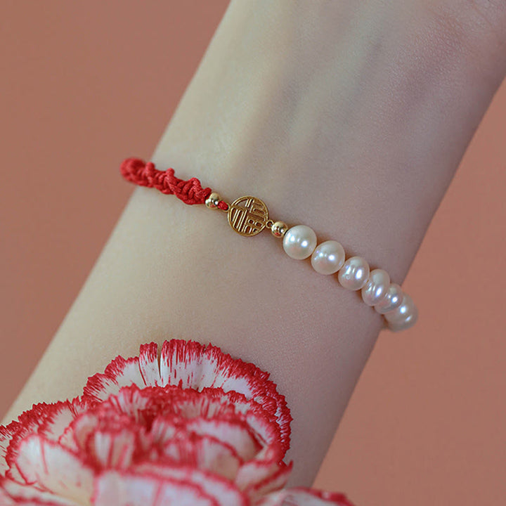 Bracelet tressé en fil rouge avec perles de protection et de chance plaquées or 14 carats