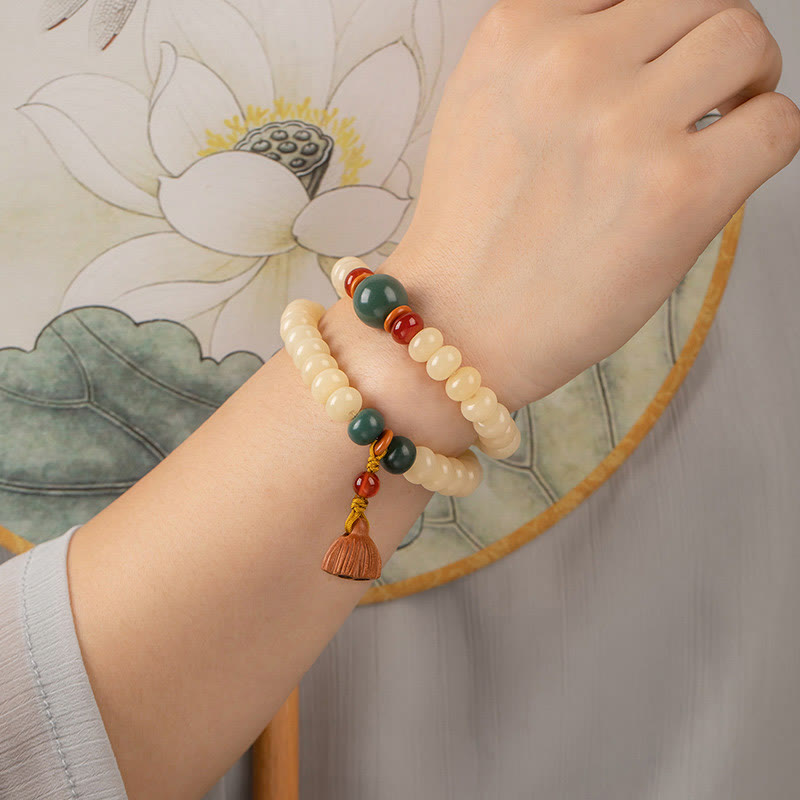 Bracelet double tour avec breloque en forme de gousse de lotus et graines de Bodhi et Buddha Stones