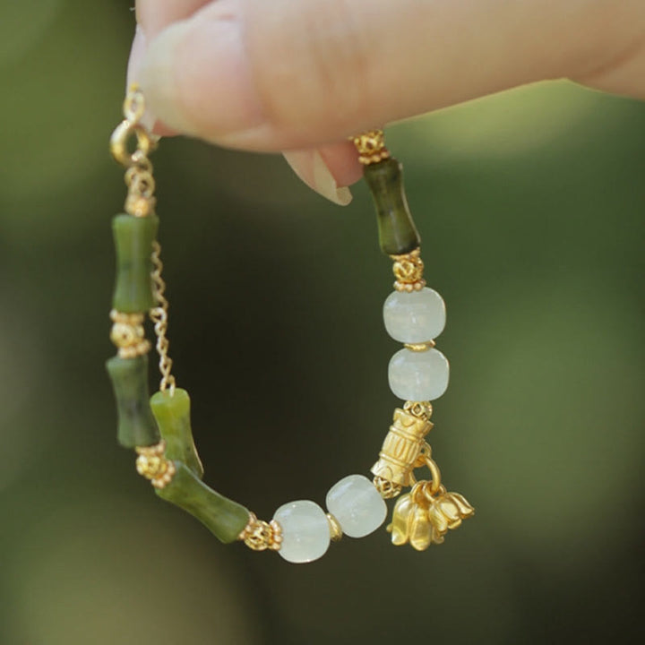 Bracelet de richesse en jade et bambou vert Buddha Stones