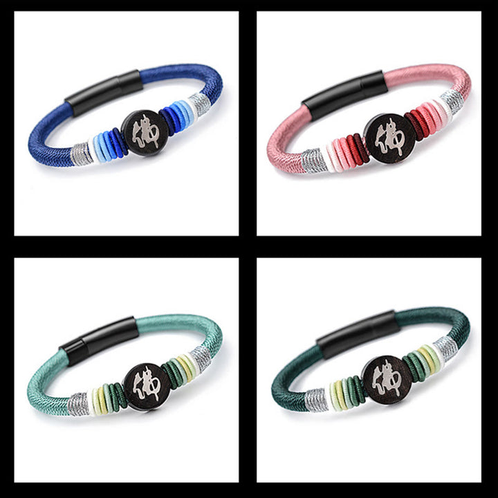 Bracelet en corde fait main en ébène avec personnage de Bouddha de Buddha Stones