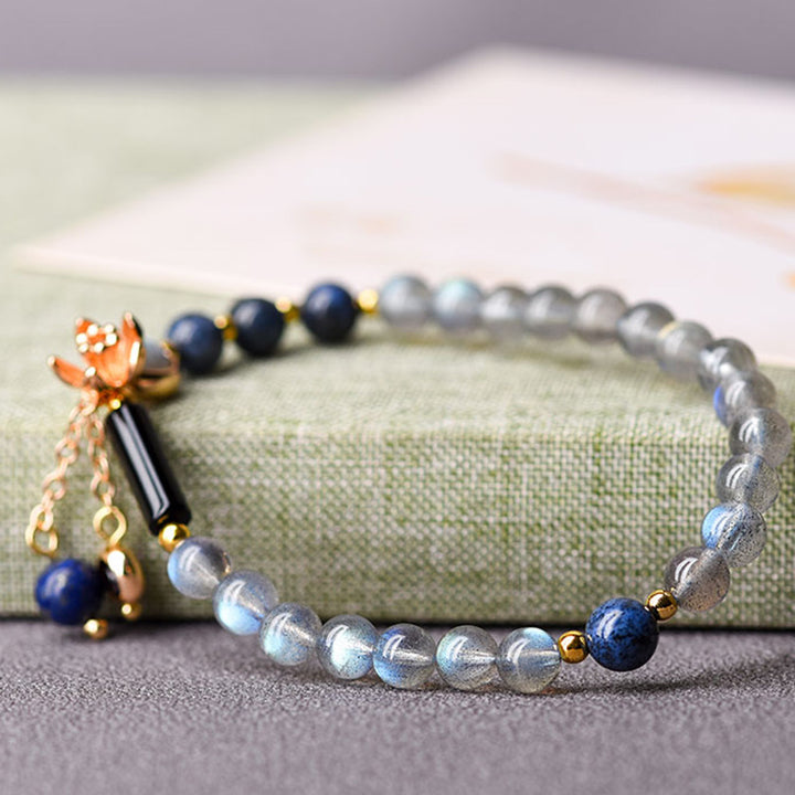 Bracelet apaisant et positif en Buddha Stones, pierre de lune, lazurite et lapis-lazuli - image 5