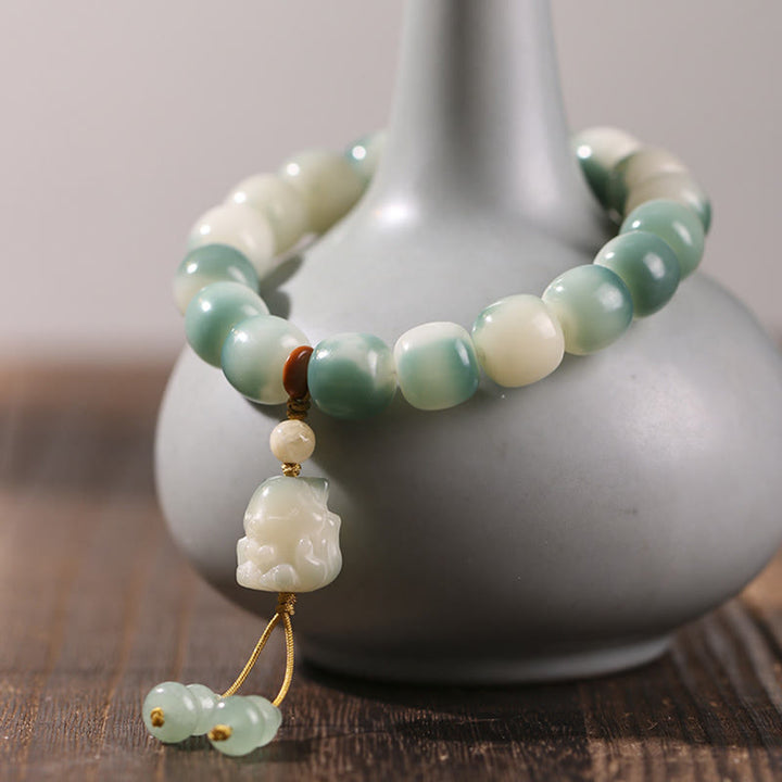 Bracelet de paix en forme de pomme de pin et de patte de chat, motif de Buddha Stones dégradées, graines de Bodhi, renard à neuf queues - image 2