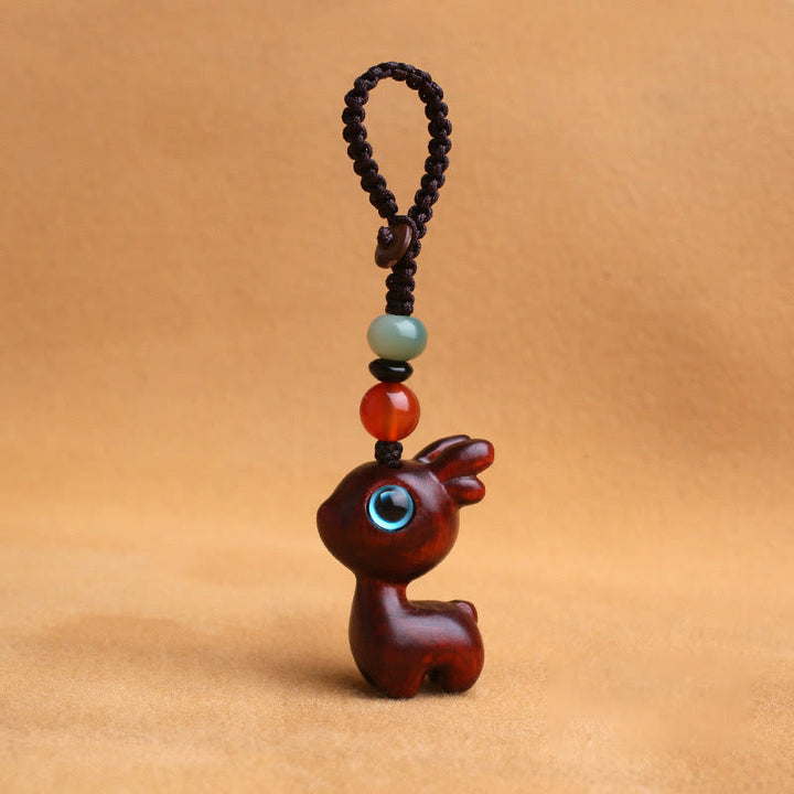 Buddha Stones de santal Petite feuille Bois de santal rouge Bois d'ébène Bois de santal vert Porte-bonheur Mini cerf sculpté Protection Porte-clés Décoration à suspendre pour téléphone