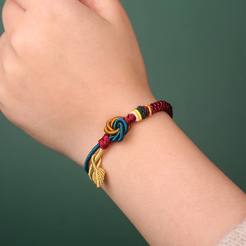 Bracelet tibétain en corde porte-bonheur fait main avec nœud mandala et Buddha Stones