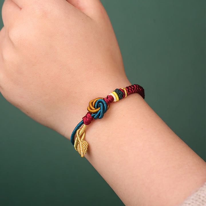 Bracelet tibétain en corde porte-bonheur fait main avec nœud mandala et Buddha Stones