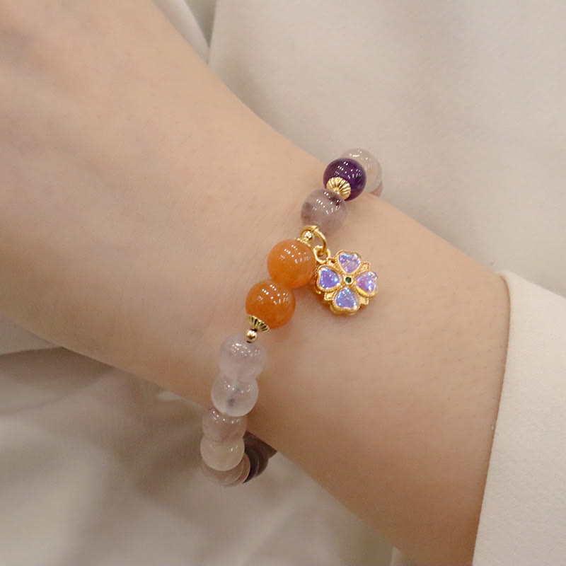Bracelet de richesse en perles de jade violet doré en Buddha Stones