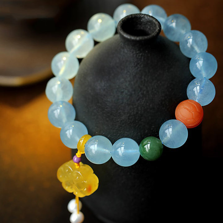 Bracelet de paix avec breloque en ambre et aigue-marine naturelle