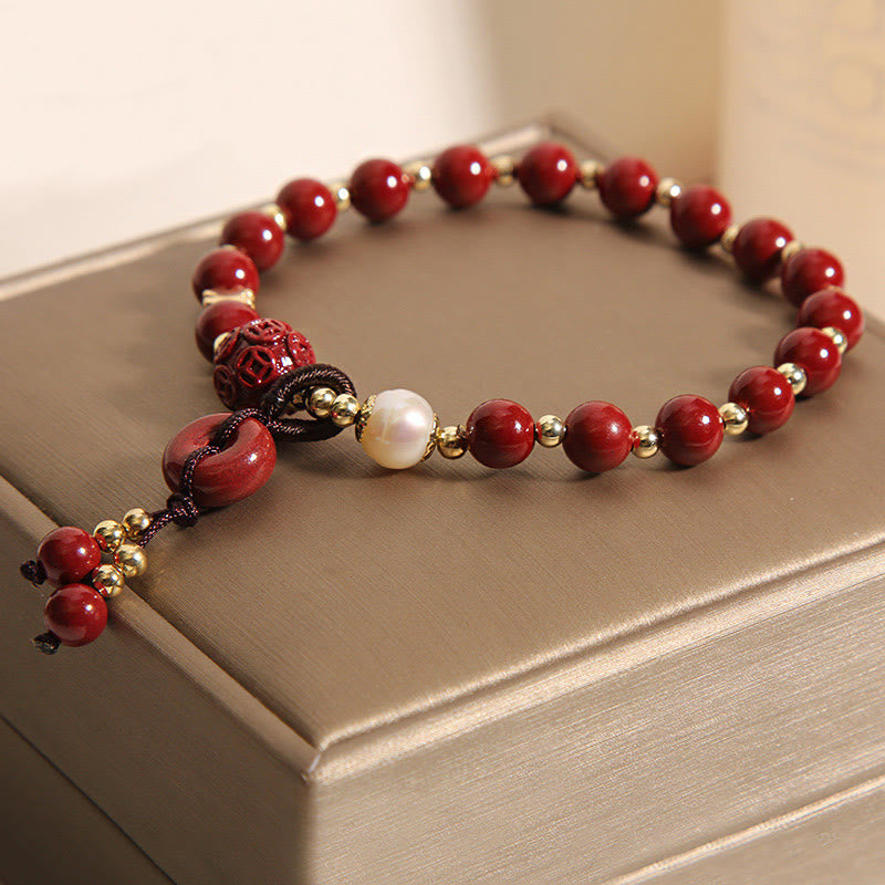 Bracelet de bénédiction avec breloque en cuivre et boucle de paix en cinabre naturel Buddha Stones