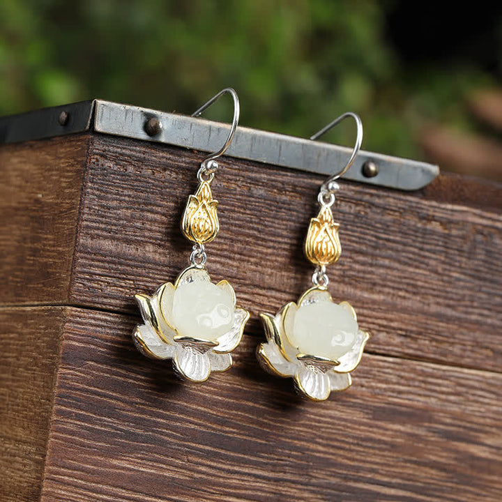 Boucles d'oreilles pendantes en jade blanc et Buddha Stones