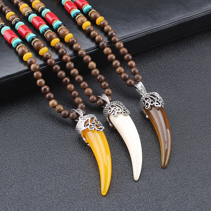 Collier pendentif de méditation en bois de wengé et pierre turquoise de style corne