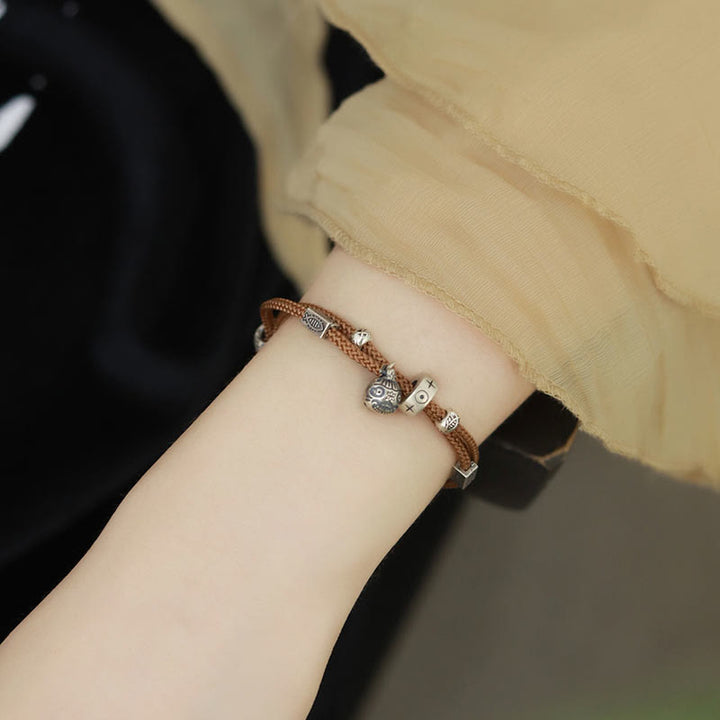 Bracelet tressé artisanal en argent sterling 925 Buddha Stones et or représentant une bête avaleuse de poisson Koi