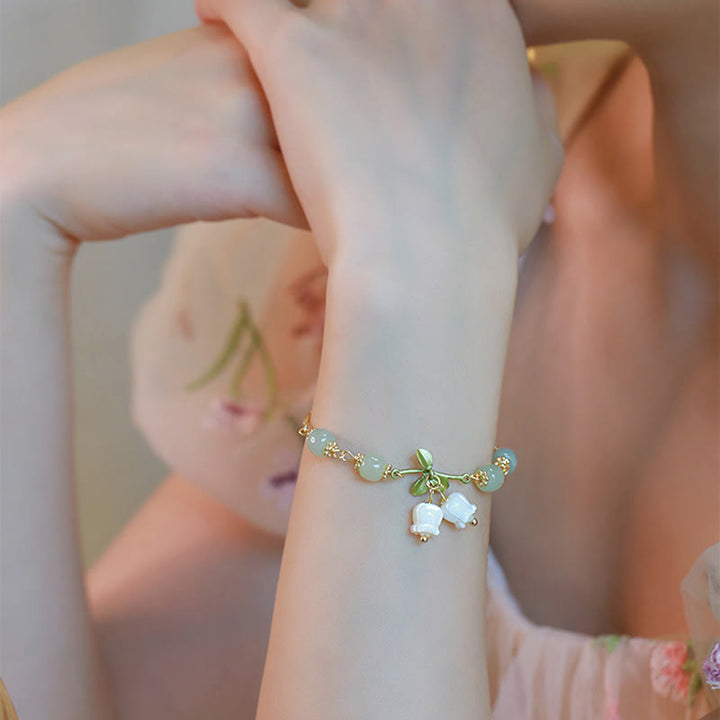 Bracelet chaîne de prospérité en perles de jade vert et muguet de Buddha Stones