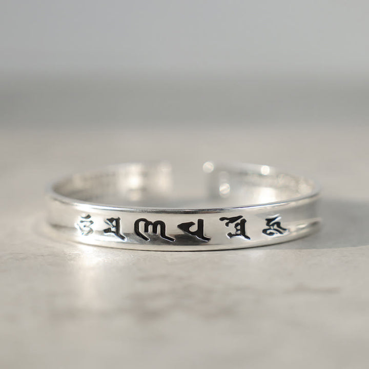 Bracelet en cuivre blanc avec mantra tibétain et Buddha Stones