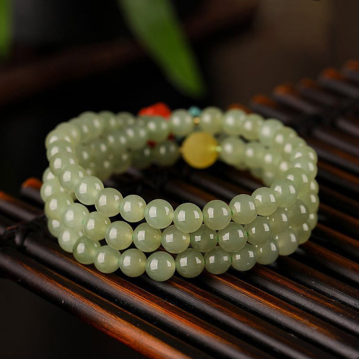 Bracelet de prospérité Bouddha rieur en jade agate rouge et ambre