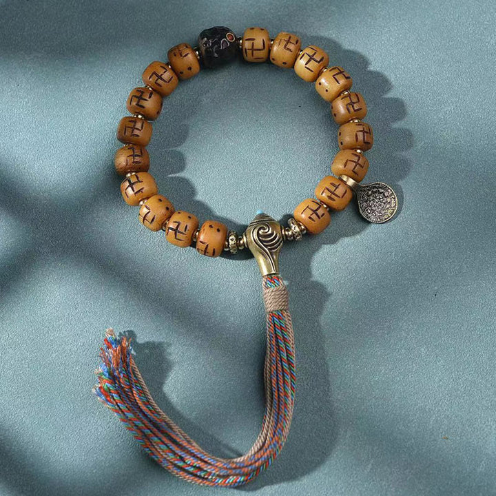 Buddha Stones en os de chameau tibétain naturel, croix gammée Dzi, perle Shankha, breloque de bouddha Kirtimukha, Bracelet à pompon de Protection porte-bonheur