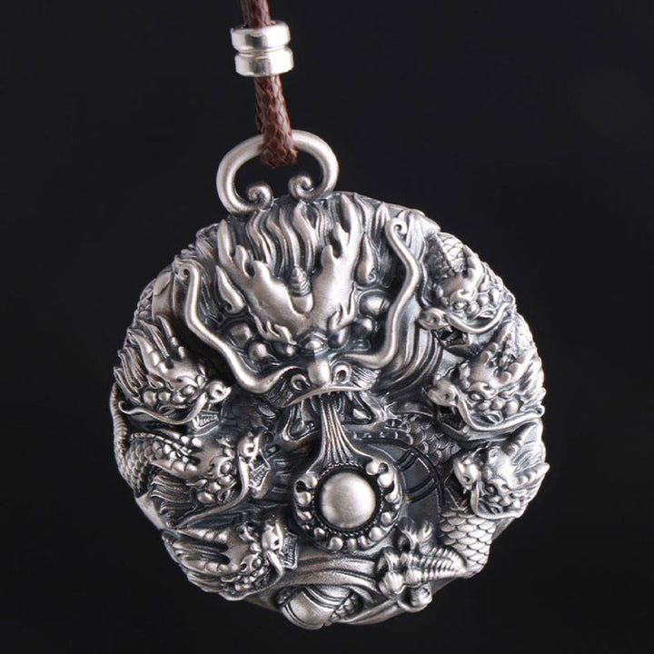 Collier de protection Buddha Stones en argent 999 Neuf dragons jouant avec une perle Pendentif de protection de la chance