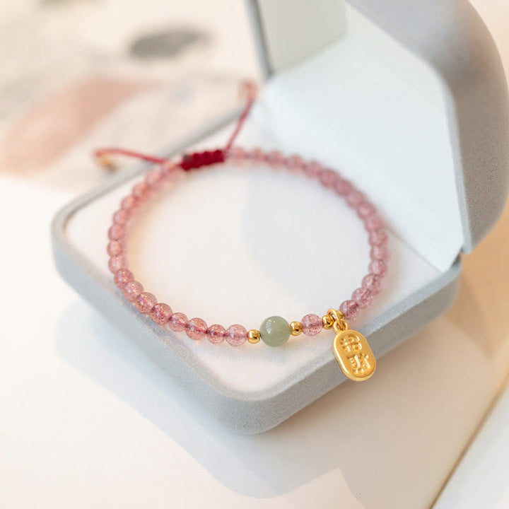 Bracelet porte-bonheur en Buddha Stones, quartz fraise, grenat, jade, caractère Fu