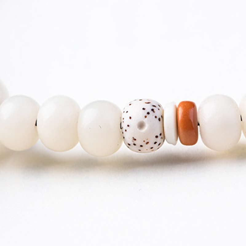 Bracelet de bénédiction Bodhi Lotus en jade blanc tibétain Buddha Stones