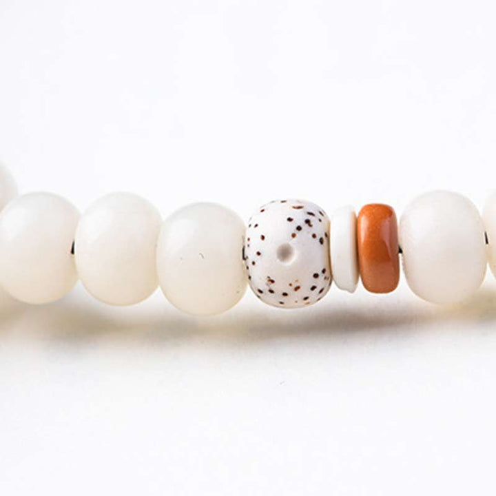 Bracelet de bénédiction Bodhi Lotus en jade blanc tibétain Buddha Stones