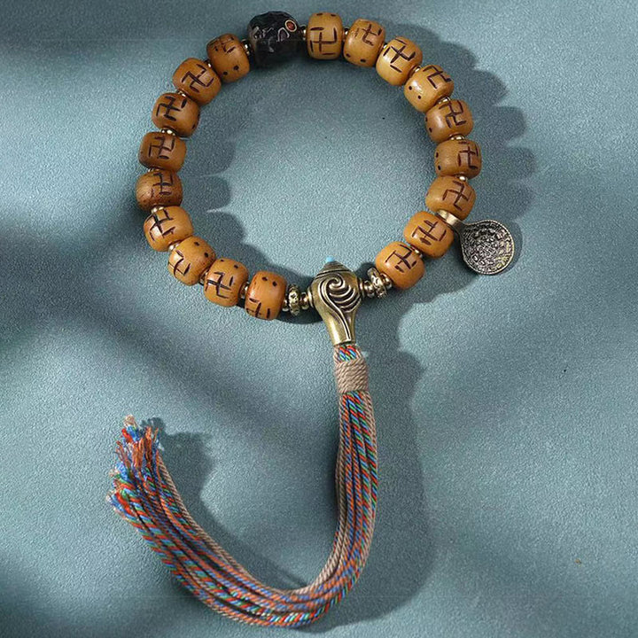 Buddha Stones en os de chameau tibétain naturel, croix gammée Dzi, perle Shankha, breloque de bouddha Kirtimukha, Bracelet à pompon de Protection porte-bonheur