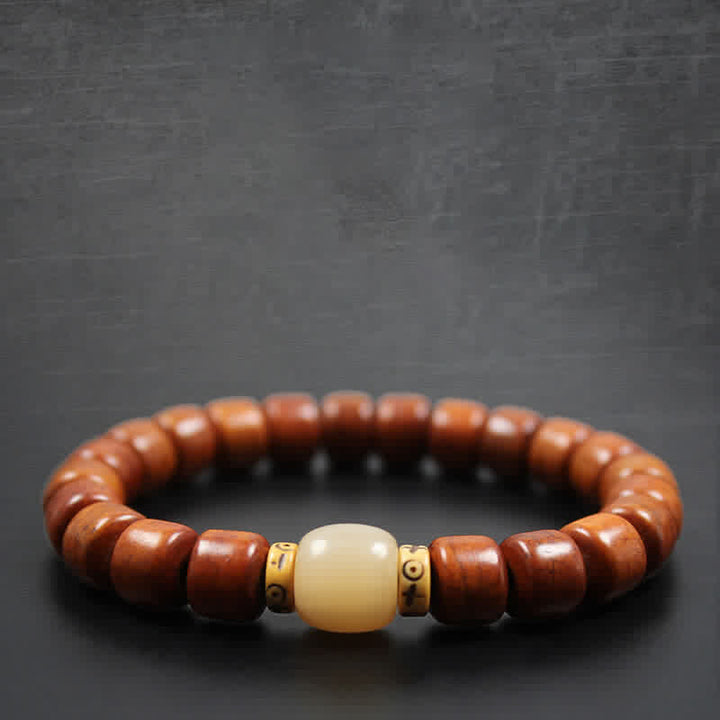 Bracelet de force en Buddha Stones, perles d'os tibétaines Om Mani Padme Hum