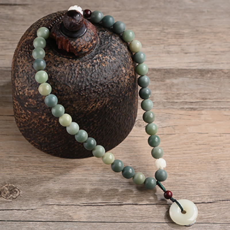 Bracelet double tour en jade et pierre de Buddha Stones avec boucle de paix et sagesse