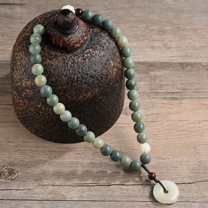 Bracelet double tour en jade et pierre de Buddha Stones avec boucle de paix et sagesse