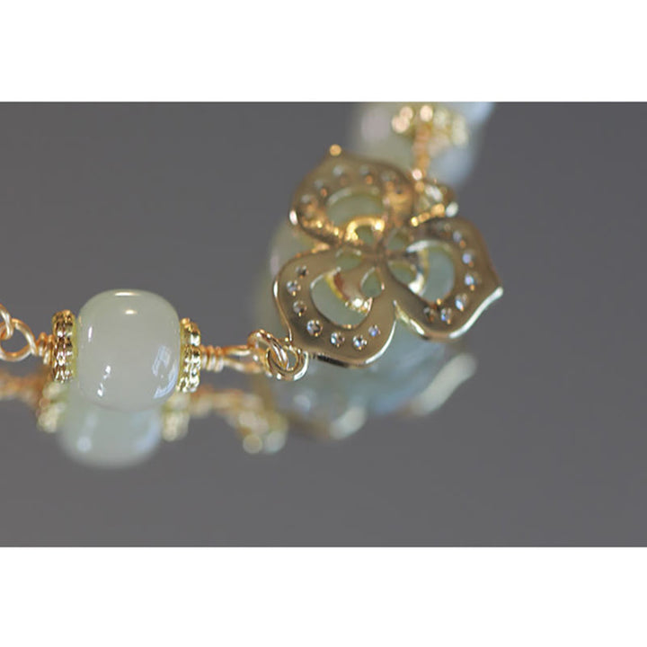 Bracelet porte-bonheur en jade Hetian plaqué or 14 carats de Buddha Stones