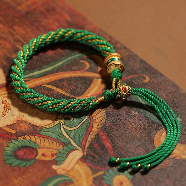 Bracelet tibétain en corde tressée avec breloque porte-bonheur Thangka en Buddha Stones