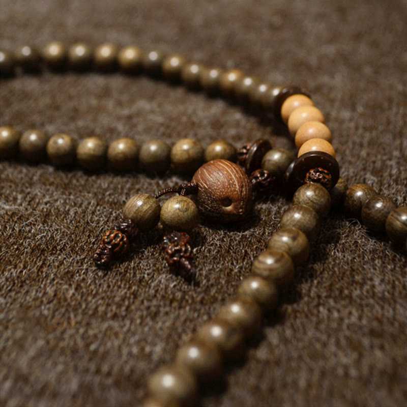 Bracelet Mala avec breloque de protection en bois de santal tibétain et Buddha Stones