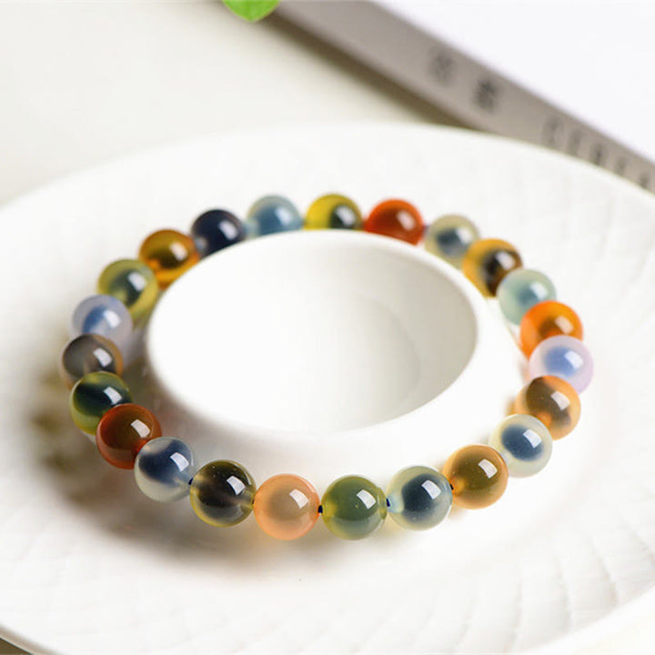 Bracelet de perles en agate naturelle colorée de Buddha Stones Harmony Strength