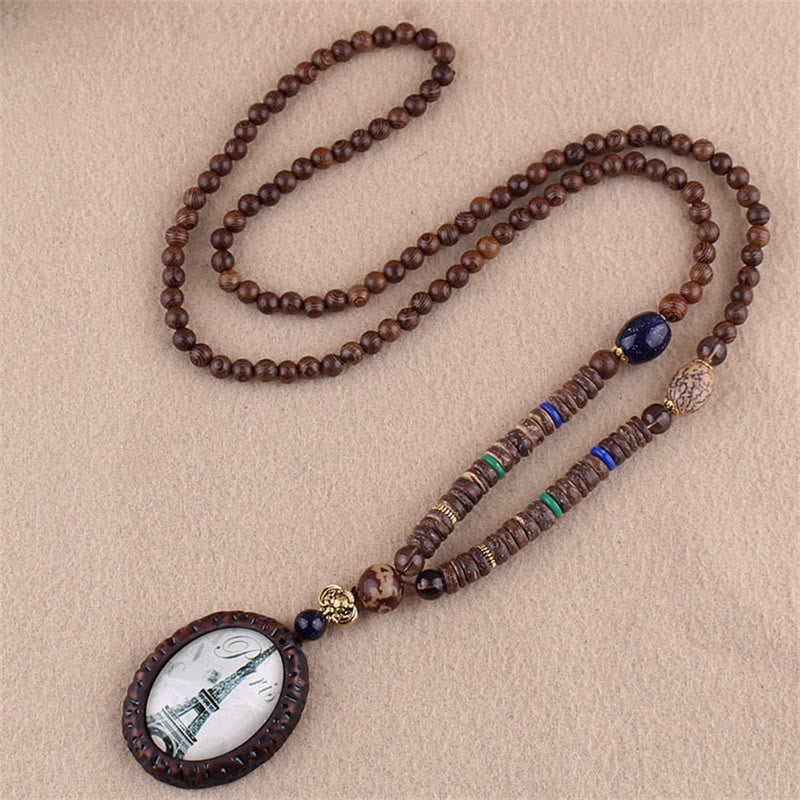 Collier pendentif protection éléphant en Buddha Stones tibétain en bois de wengé Bodhi Seed Agate