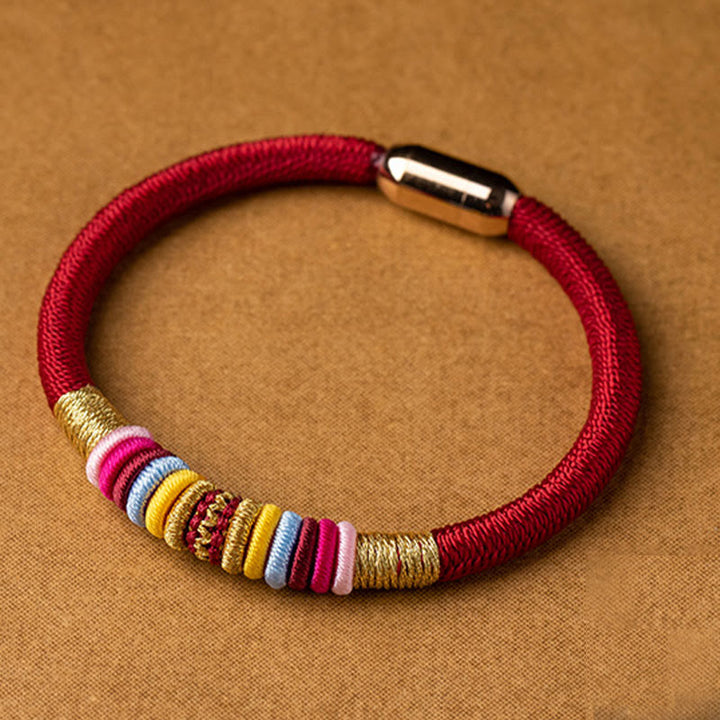Bracelet tressé à boucle magnétique en Buddha Stones tibétaines fait à la main avec protection des nœuds King Kong